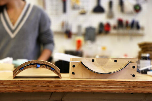 photo of cork laminations and mold frame in lab